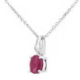 0.43ct Oval Ruby and Diamond Pave Pendant in 9ct White Gold